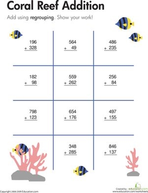 Students working on a Coral Reef themed worksheet for three-digit addition with regrouping