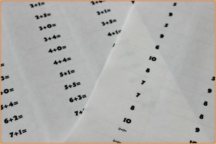 Fourth grade math addition worksheet with egg-themed coloring activity for practicing addition facts