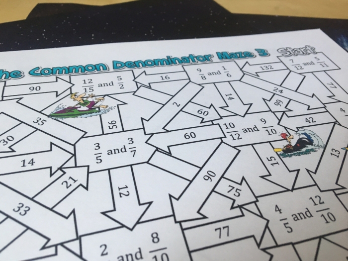 Fifth grade students comparing two different mathematical methods for finding common denominators on a worksheet