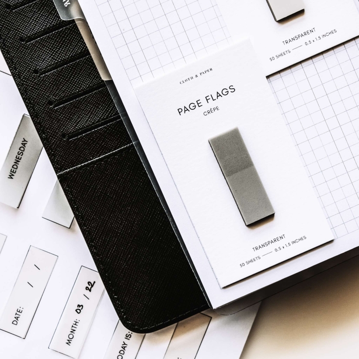 Third grade students studying the origins and evolution of the American flag on a printed worksheet