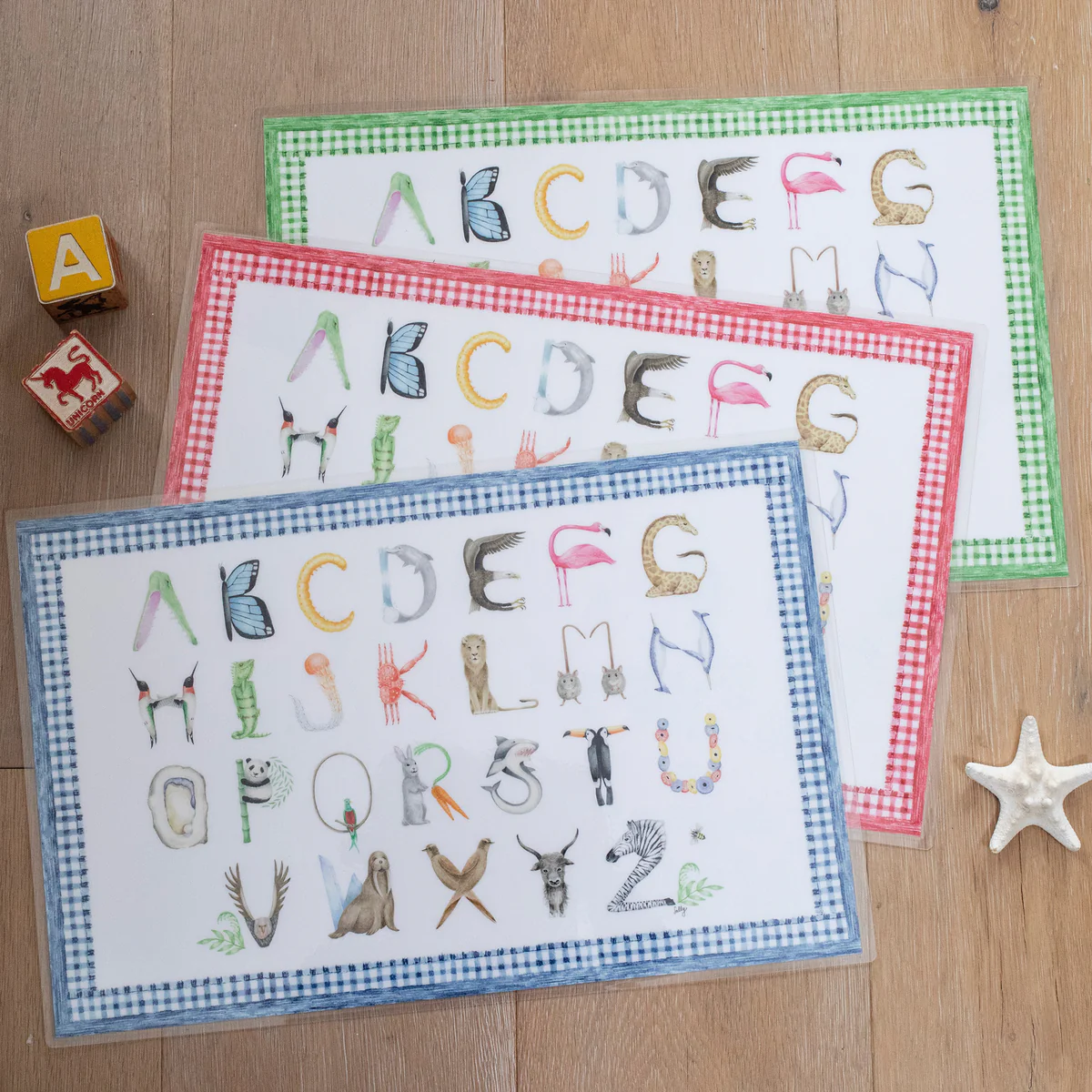 Colorful Animal Alphabet Placemat worksheet for Pre-K students featuring animals and letters