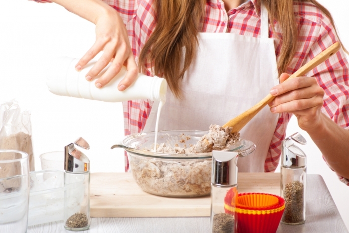 Baking with Fractions worksheet for fifth graders focusing on ingredient calculations