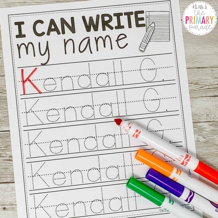 Pre-K student practicing name writing skills on assessment worksheet 17