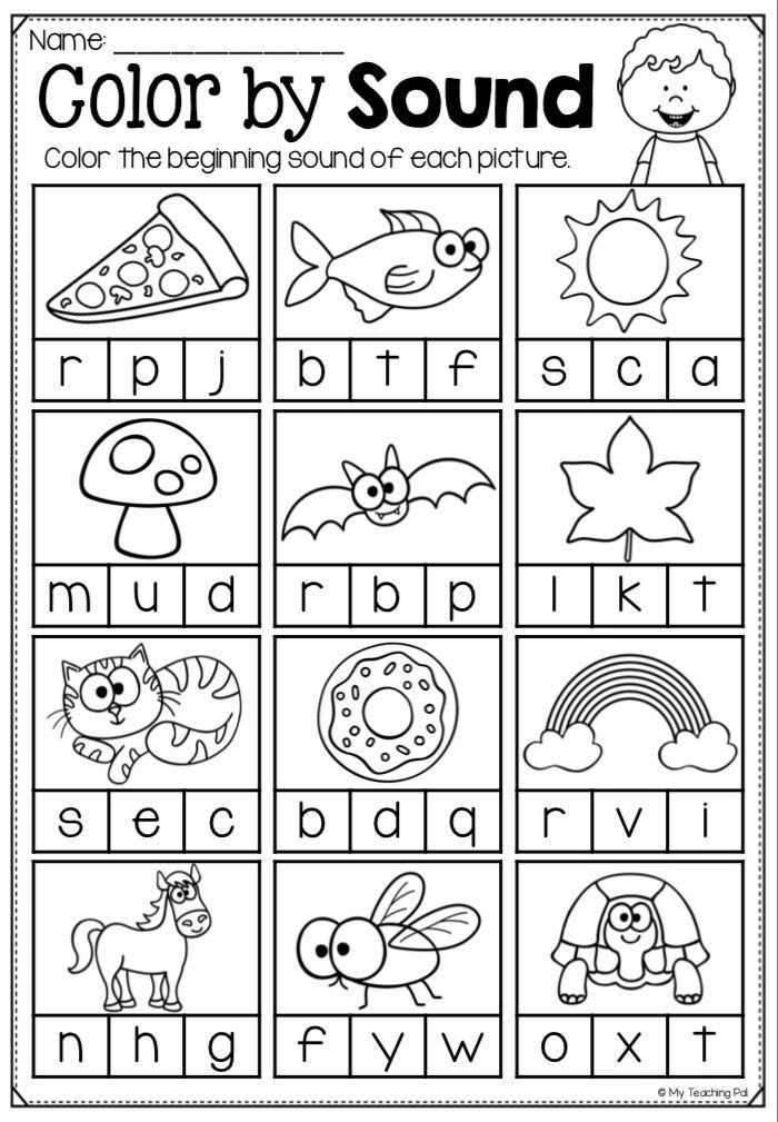 Preschooler practicing letter A recognition on a colorful phonics worksheet