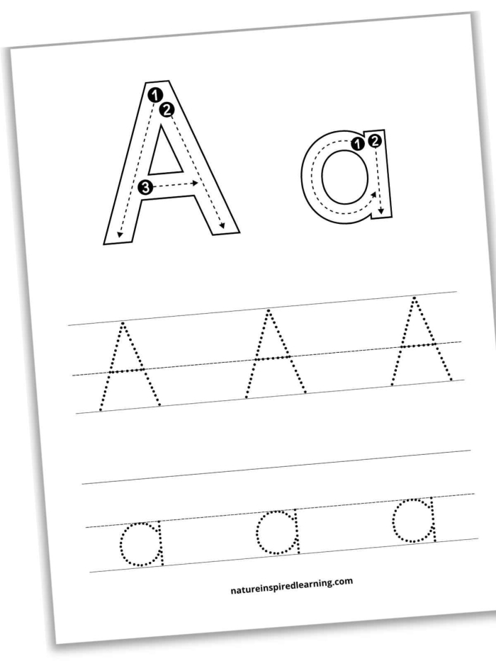 A pre-kindergarten student practicing writing uppercase letters A through Z on a worksheet with dotted line guides