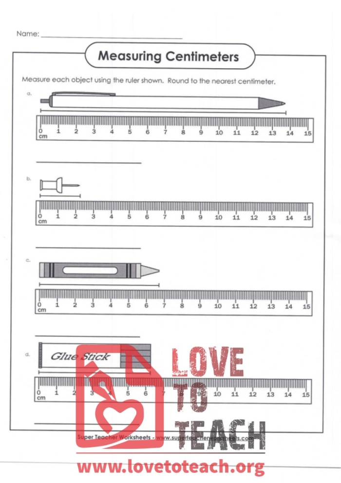 A first grade student using mini rulers to measure various objects in centimeters on a worksheet