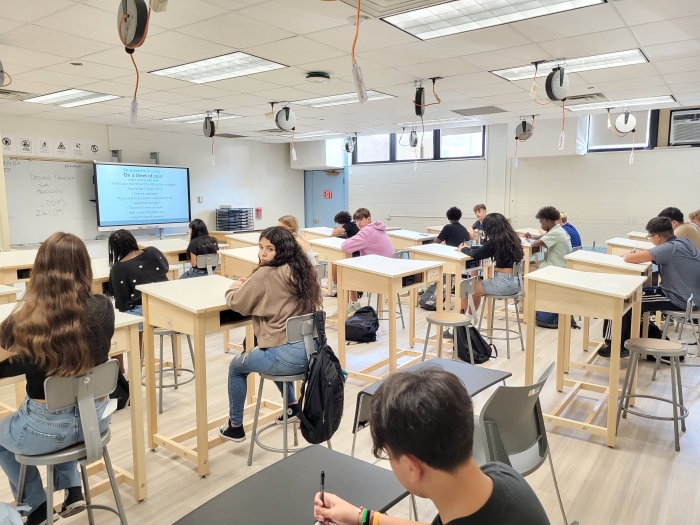 Worksheet for tracing and writing about Olympic snowboarder Chloe Kim for Pre-K students