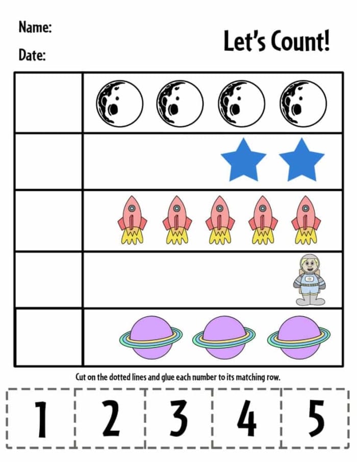 Pre-K Color by Number worksheet featuring a rocket ship and friendly alien in outer space
