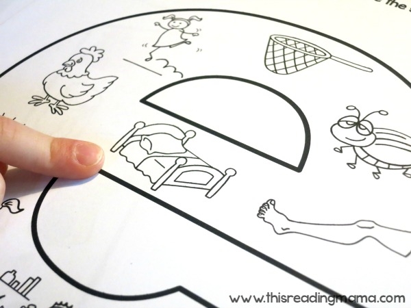 First grade color by short vowel sound activity with pictures and color-coded vowel letters