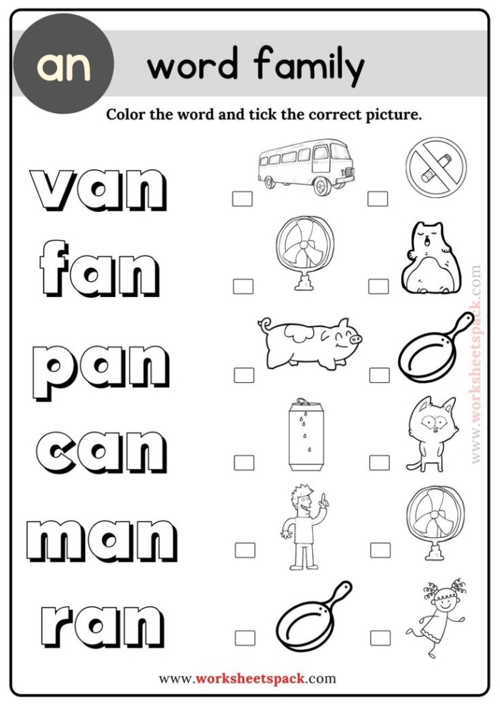 Kindergarten students matching op an and at words on a colorful word families worksheet
