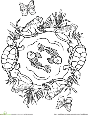 A first grade student coloring a school-themed mandala worksheet to celebrate the new school year