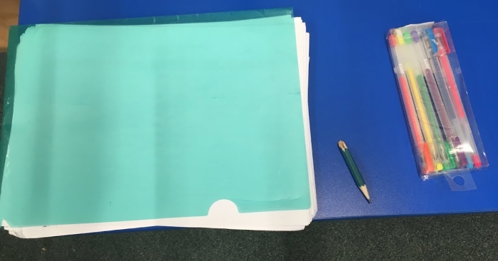 Pre-K worksheet page 17 asking children to identify which community helper does not belong in the group