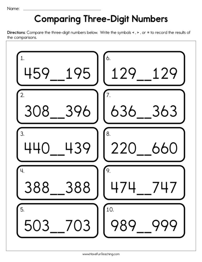 Comparing Three Digit Numbers Assessment Worksheet for Grade 2 Students Second grade students working on a comparing three digit numbers check-in worksheet