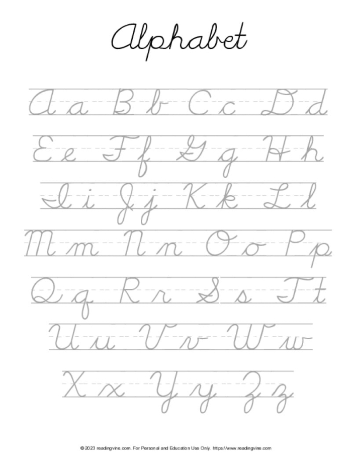 First grade student practicing cursive handwriting of their first and last name on a lined worksheet with dotted letter guides