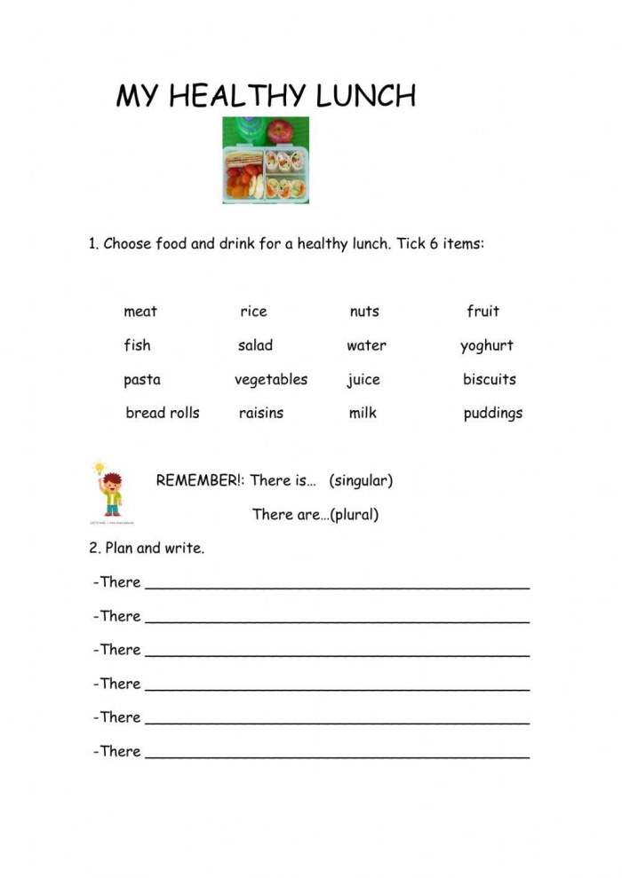 A preschooler busy with a Cut and Paste a Healthy Lunch worksheet