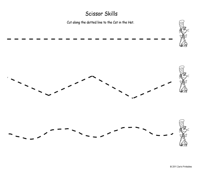 Kids practicing cutting and coloring to create grass for bugs in a fun worksheet