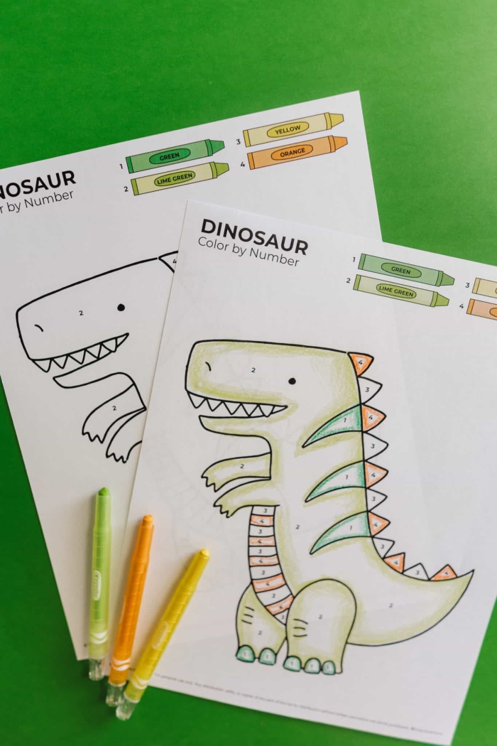 Dinosaur Color by Number Activity for Early Learners Image 16 A kindergarten student coloring a dinosaur illustration by matching numbers to specific colors on a worksheet