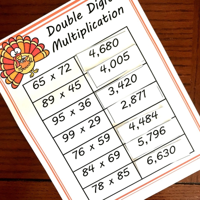 Double-Digit Multiplication Worksheet Number 20 for Fourth Grade Practice Fourth grade math student completing a double-digit multiplication worksheet with written work