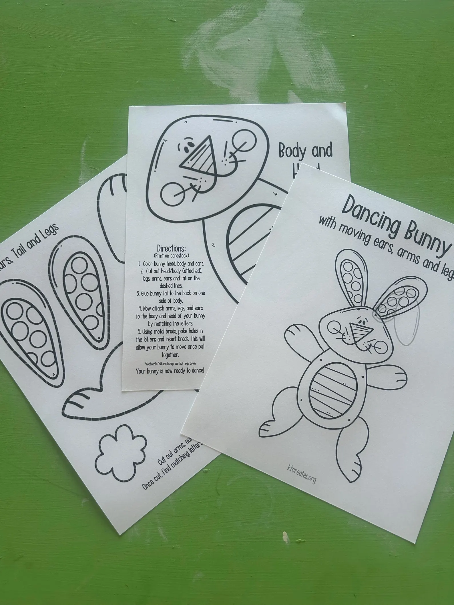 Pre-K students coloring Easter Bunny Stand-Ups worksheet 21 for spring holiday decorations