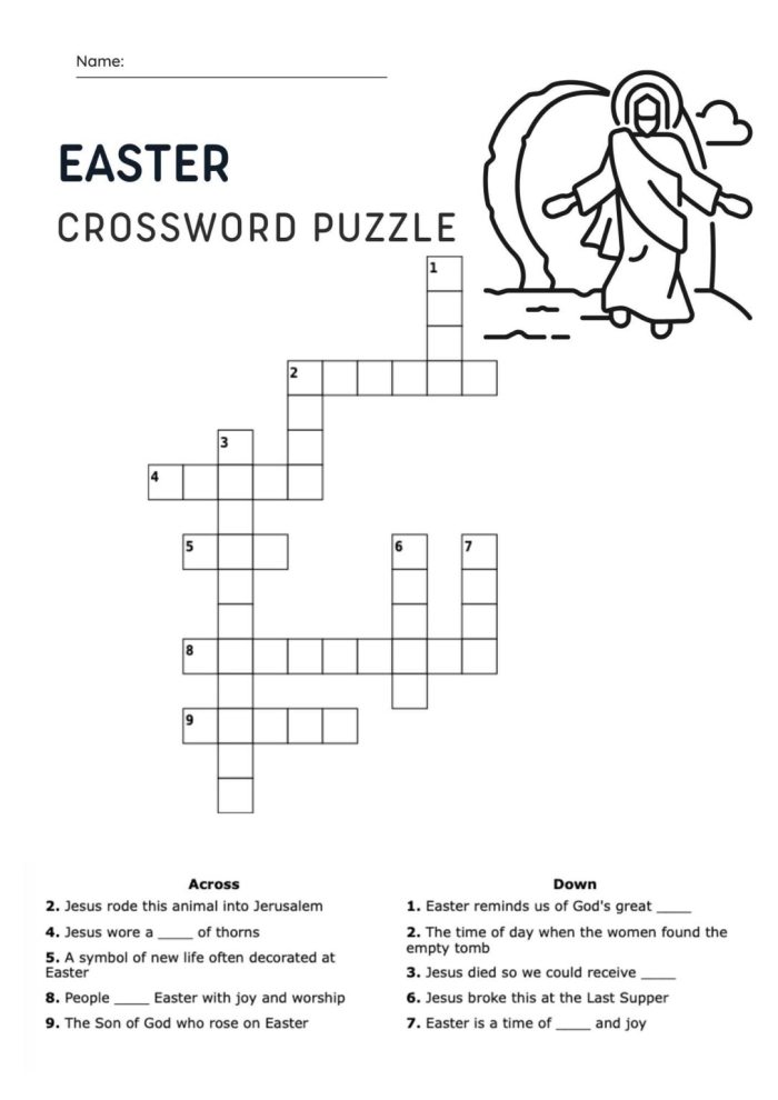 Second grade students solving an Easter-themed crossword puzzle worksheet with spring holiday vocabulary