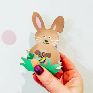 Third grade students assembling an Easter egg holder counting worksheet