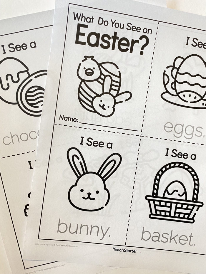 Kindergarten student assembling an educational Easter Mini-Book worksheet for earth and space science