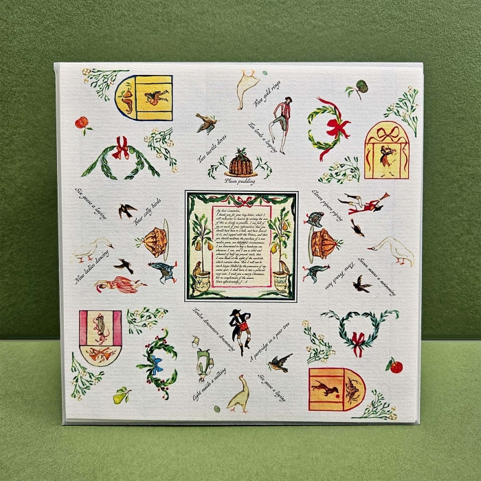 Eleven Pipers Piping worksheet featuring a festive band and falling snowflakes to count