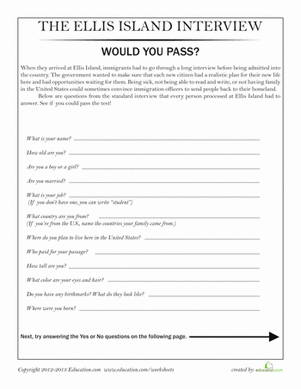 Fifth grade students examining illustrations of historical immigrant trunks and suitcases for an Ellis Island activity