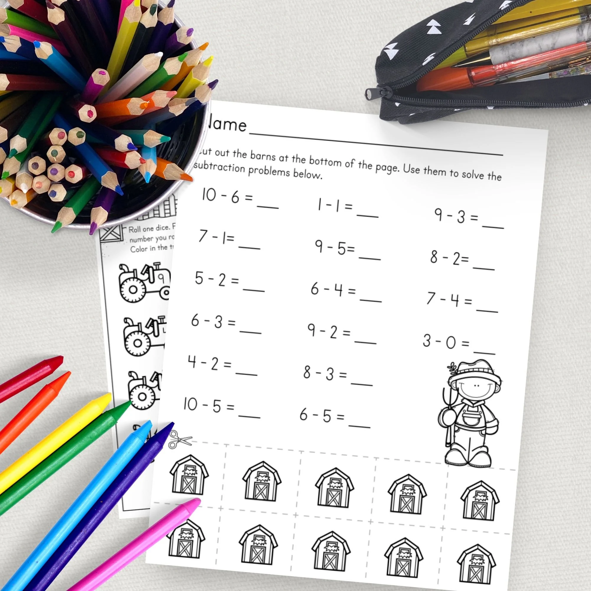 Kindergarten students solving farm animal subtraction problems on a practice worksheet