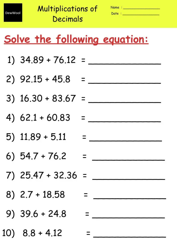 Fifth grade students working on an Adding Decimals worksheet involving thousandths