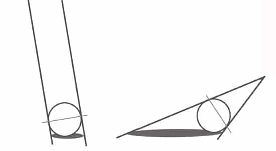 A fifth grade student practicing shading techniques on geometric shapes for a light and shadow worksheet