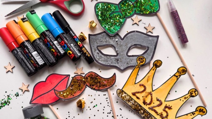 First grade student coloring an elegant masquerade mask for a New Year celebration