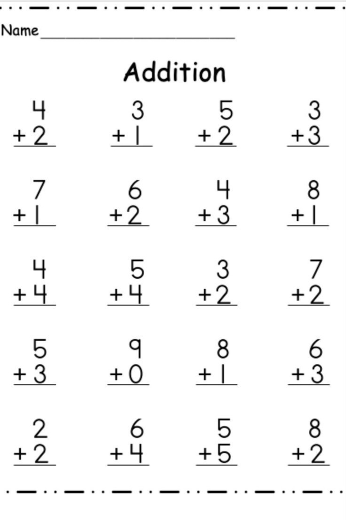 First grade students solving addition problems with sums up to 20 on an assessment worksheet