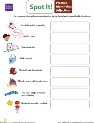 First grade student working on a Get into Grammar practice worksheet focused on adjectives