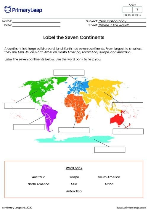 First grade student using a cut-and-paste activity to identify and label the seven continents