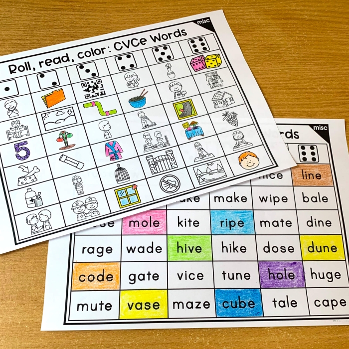 First grade students rolling dice to build long A CVCe words on a phonics worksheet