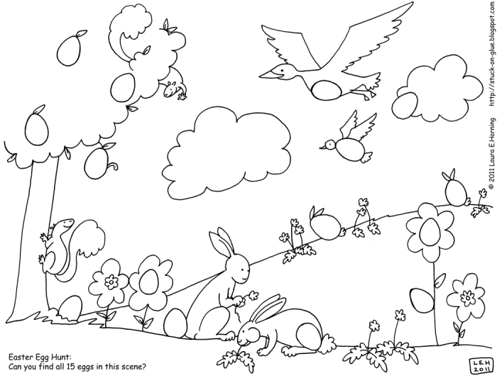 First grade student looking at a worksheet featuring a silly Easter bunny who has lost his eggs