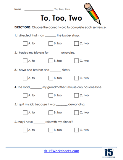 First grade student completing a grammar worksheet about choosing between to too or two