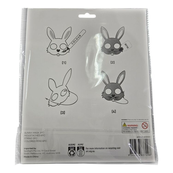 First grade student working on a creative lace mask geometry worksheet for a New Year Eve masquerade party