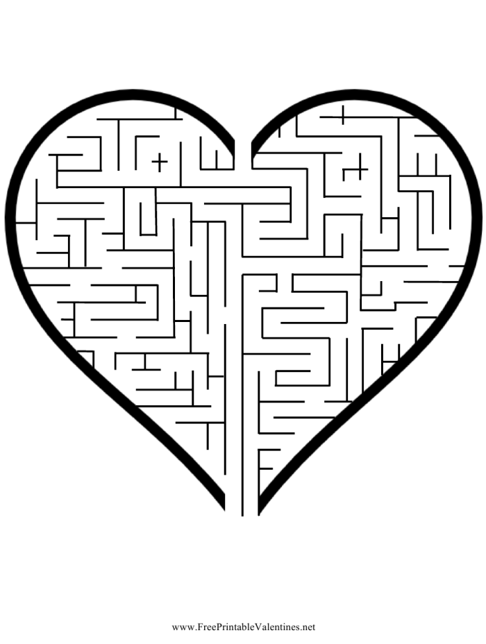 Heart Maze Puzzle 2: Valentine's Day Division Activity for First Grade First grade student navigating a Valentine's Day heart-shaped maze by drawing a line to the center heart for division practice
