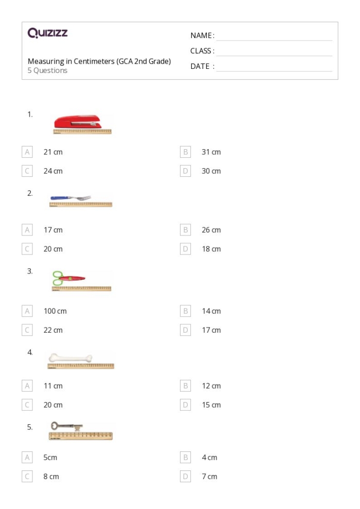 First grader measuring school supplies using a ruler marked in centimeters