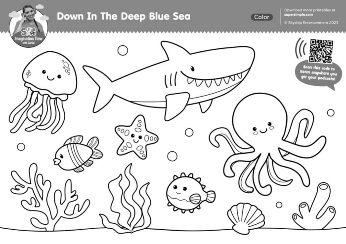 First grade students playing a Halloween themed monster go fish card game for a life science lesson