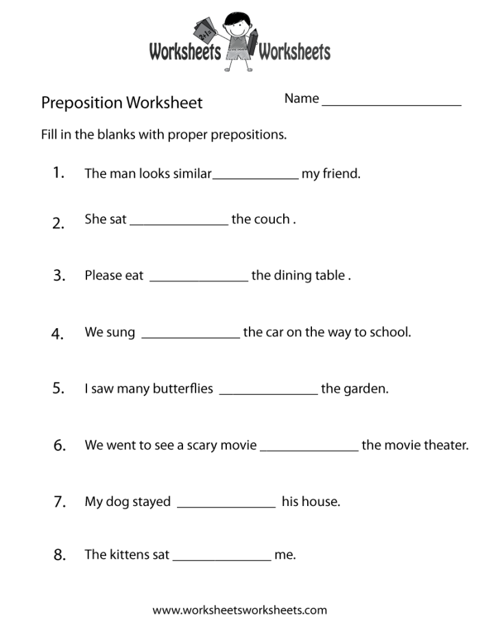 Educational pet themed preposition worksheet for first grade students First grade preposition practice worksheet featuring pet illustrations to help students learn positional words