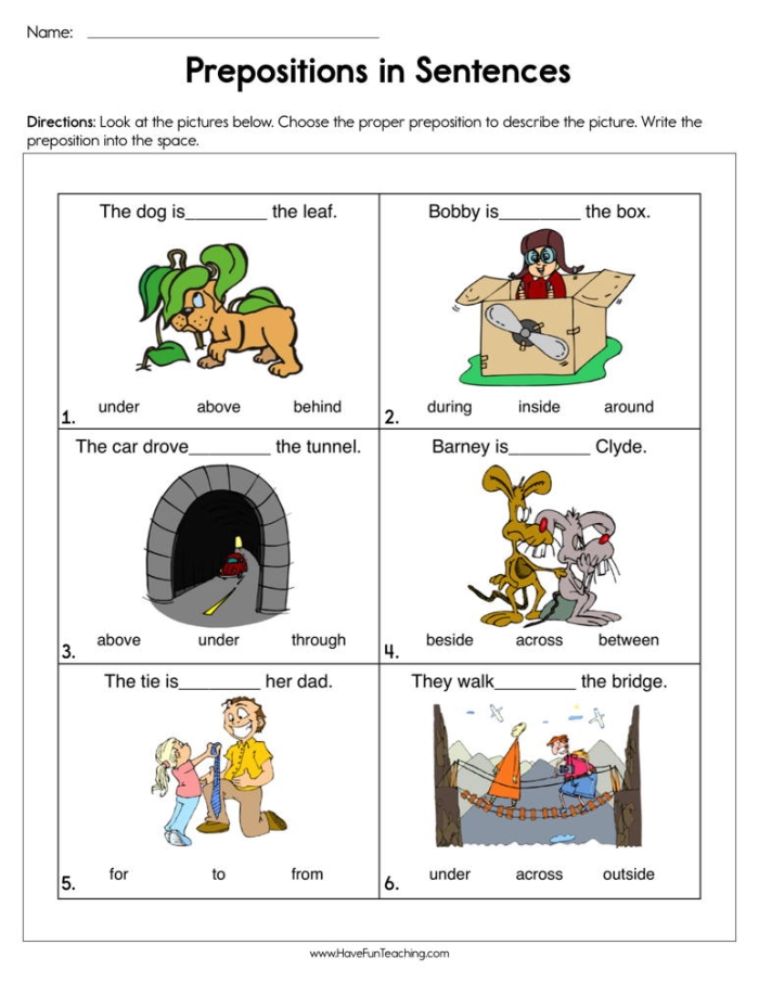 First grade students completing fill-in-the-blank preposition sentence exercises with multiple choice answers