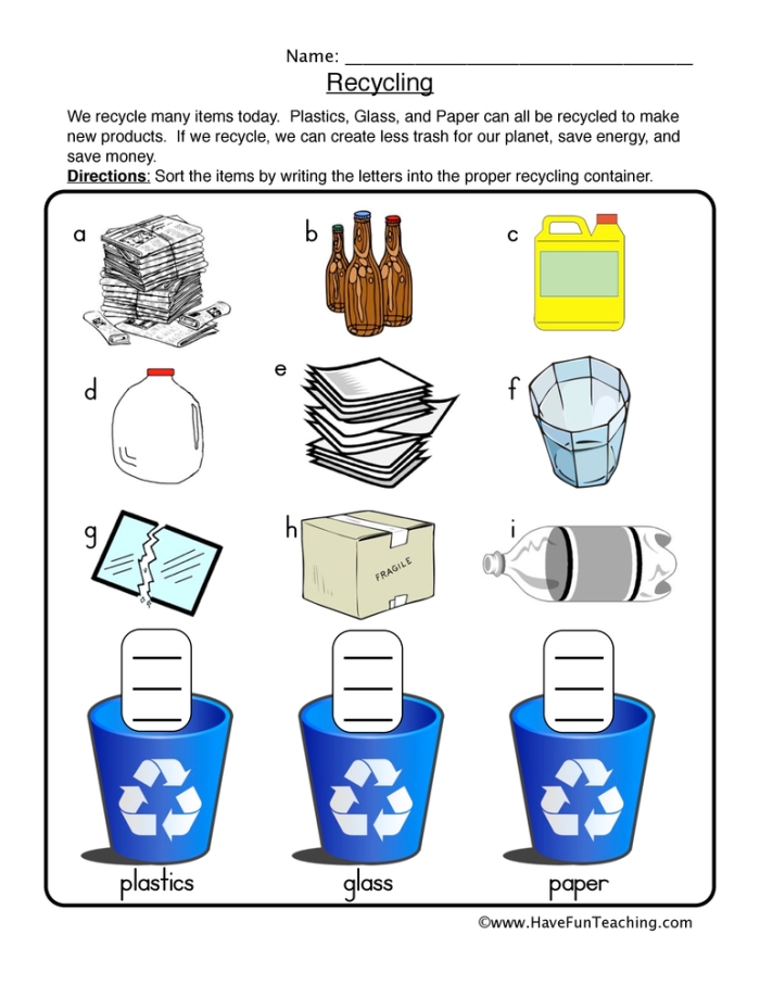 First grade students coloring and matching recyclable items on a Recycle Worksheet