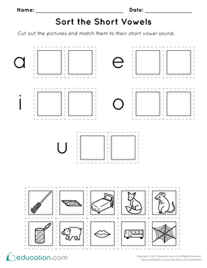 Cut and paste worksheet for sorting short vowel words for first graders