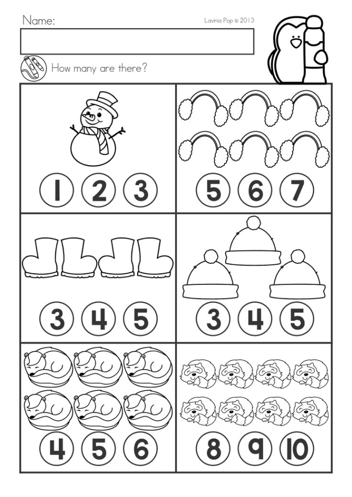 First grade student practicing single-digit addition with a festive winter math worksheet