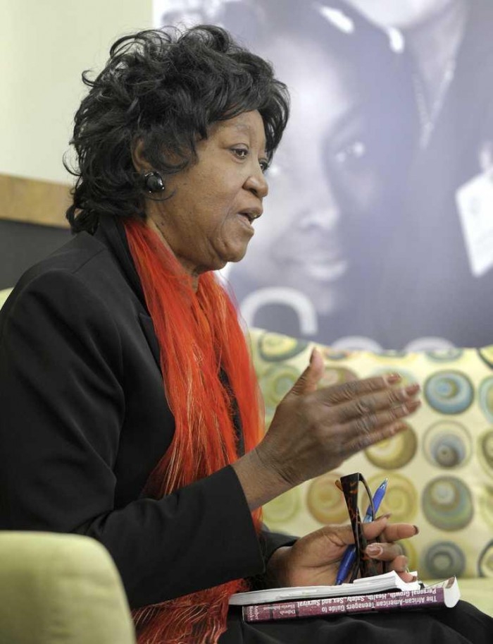 First grade worksheet featuring a biography and portrait of activist Dorothy Pitman Hughes