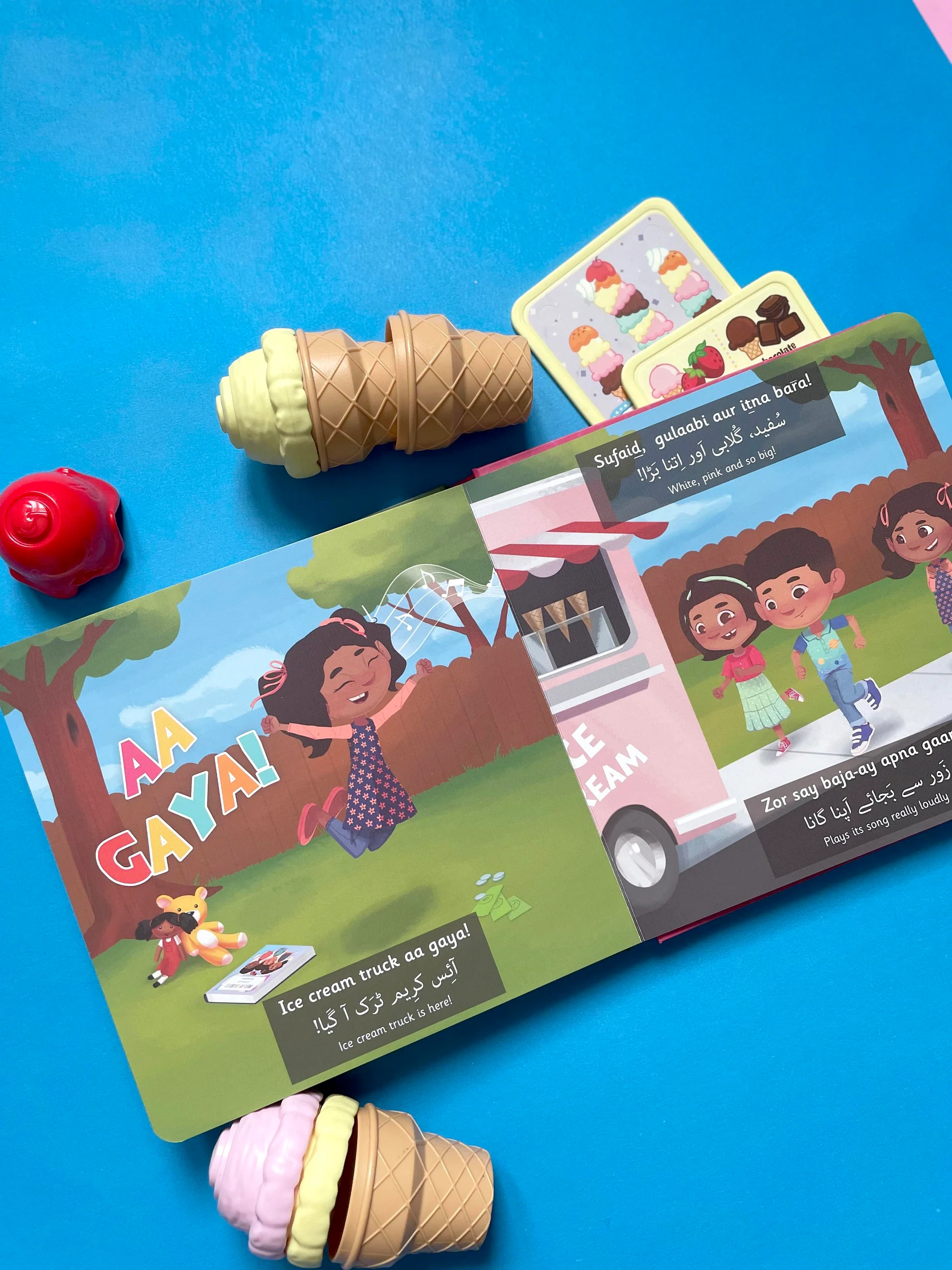 A second grade student worksheet showing sentences about an ice cream shop with capitalization and punctuation errors to correct