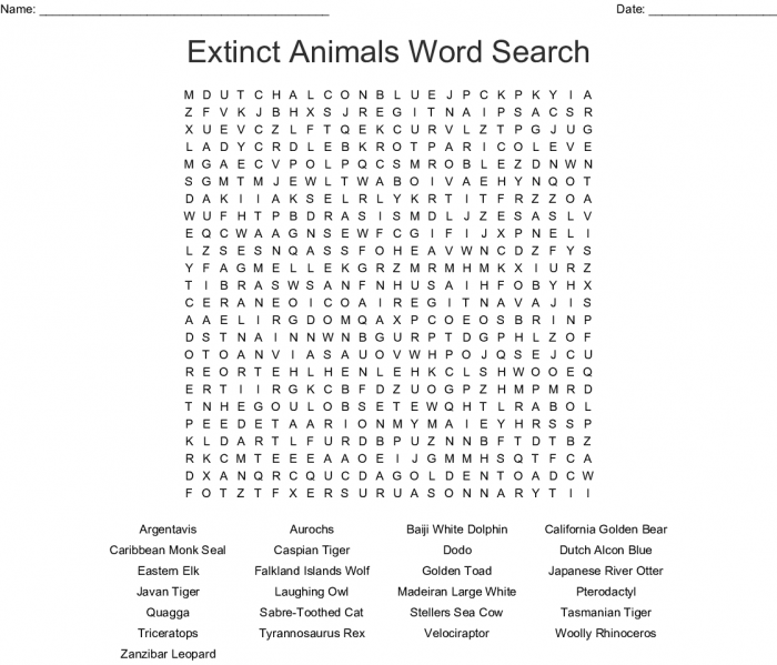 Third grade students solving a crossword puzzle about fossils and prehistoric creatures